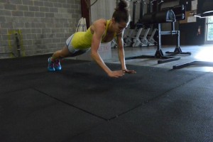 Coach Alexis getting some air on a clapping pushup!