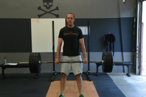 Justin standing up a deadlift