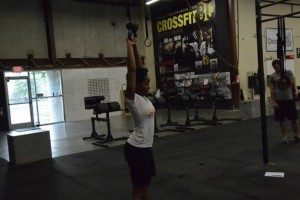 Chasity showing a completed rep for the kb swing