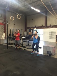 Coach Ryan and Alexis going after Friday's wod!