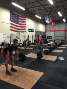 Drilling technique at the Olympic lifting class.