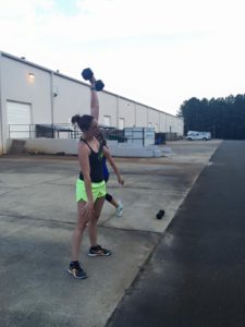 Kerry repping out some dumbell snatches!